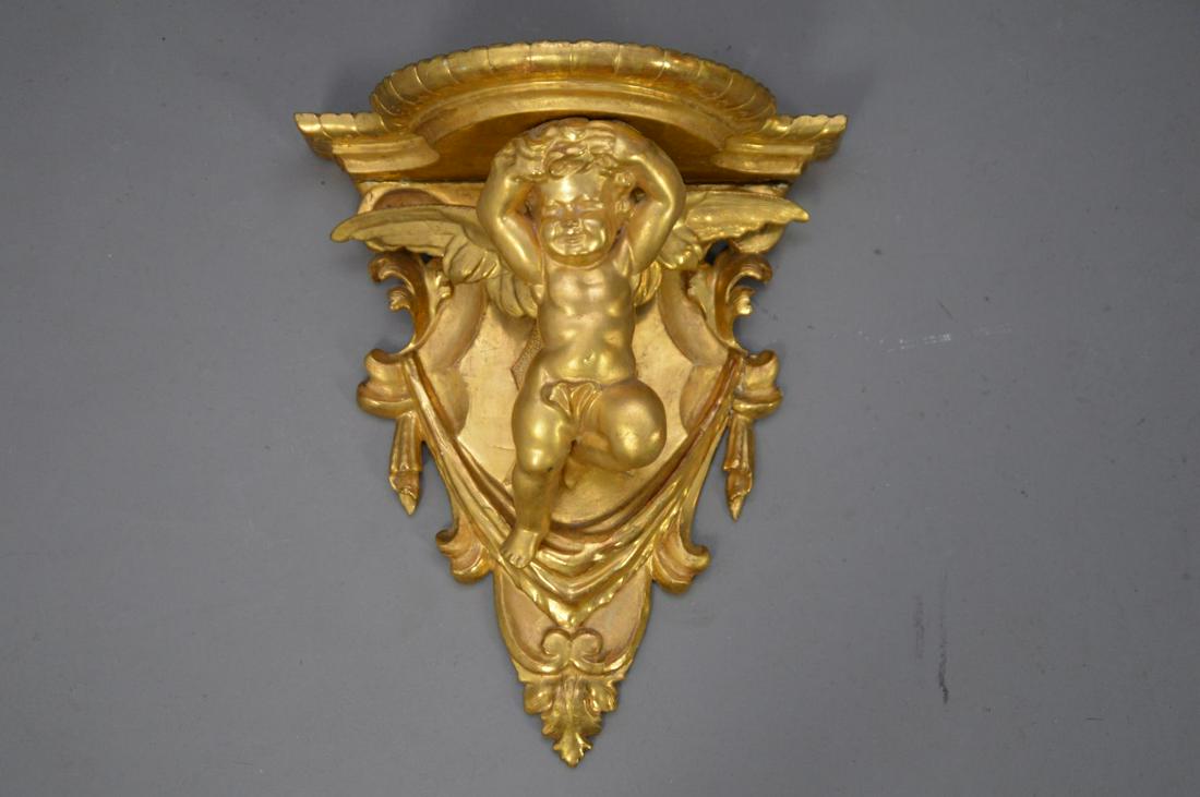 19TH CENTURY CARVED GILTWOOD FIGURAL ANGEL BRACKET.: 19TH CENTURY CARVED GILTWOOD FIGURAL ANGEL BRACKET. Condition: good. Height 19" Width 16"