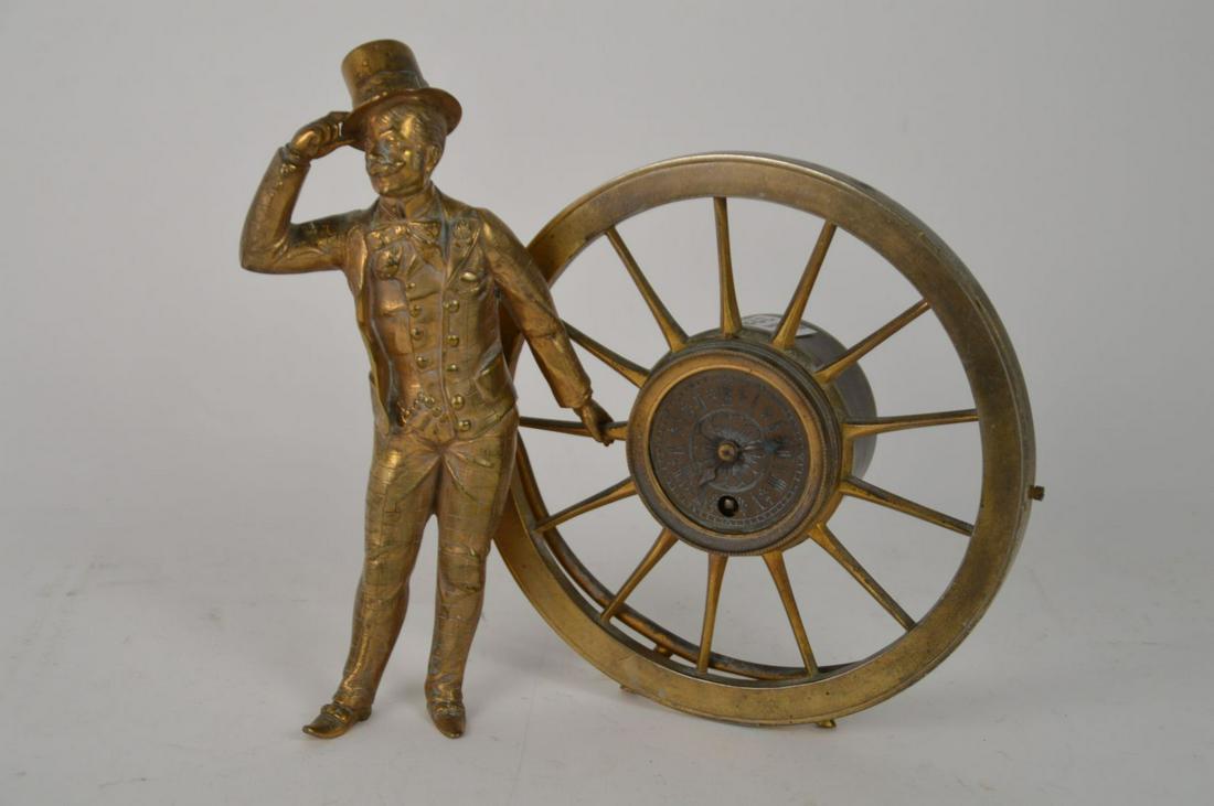 Brass Clock with Ships Wheel and Figure, 11"h x 11"w: Brass Clock with Ships Wheel and Figure, 11"h x 11"w