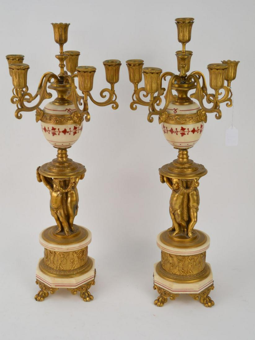 PAIR FIGURAL BRONZE CANDELABRA. Condition: no damage: PAIR FIGURAL BRONZE CANDELABRA. Condition: no damage identified. Height 23 1/2" Dia. 9"