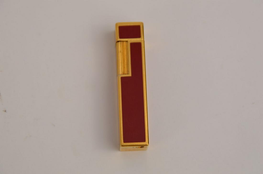 Cartier Lighter. 18K Gold Plate. Size 2.5" Condition: Cartier Lighter. 18K Gold Plate. Size 2.5" Condition normal wear.