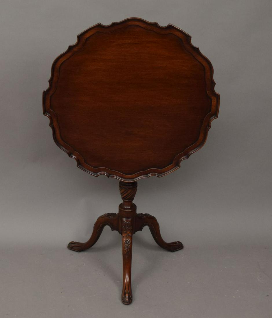 Diminutive mahogany tilt-top pie crust table, 27" H x: Diminutive mahogany tilt-top pie crust table, 27" H x 24" D