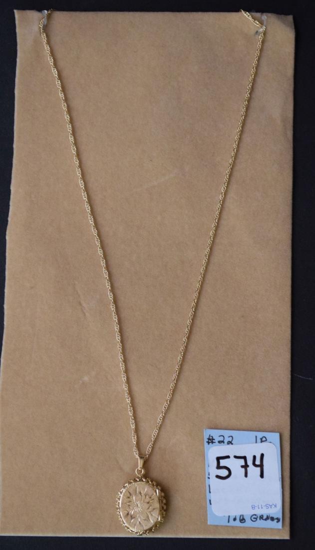 14kt yellow gold Locket on 14kt chain (18") Locket: 14kt yellow gold Locket on 14kt chain (18") Locket inscribed on back "With Love Class of 86", 7.6 grams