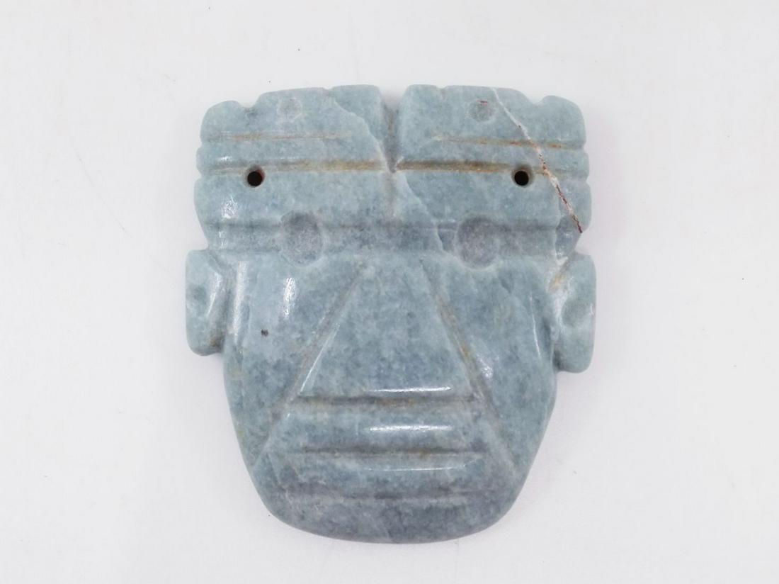 Pre-Columbian Blue Jade Maskette, Incised Lines, Avian: Pre-Columbian Blue Jade Maskette, Incised Lines, Avian Features, Ceremonial Half Back, Origin: Costa Rica, 800 A.D, Dimensions: 2" x 1 3/4"