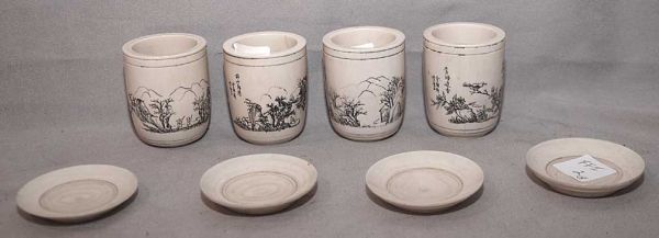 Ivory Carved & decorated Tea cups & saucers: Ivory Carved & decorated Tea cups & saucers 2" tall x 2-1/2" wide 8 pieces; (4 sets)