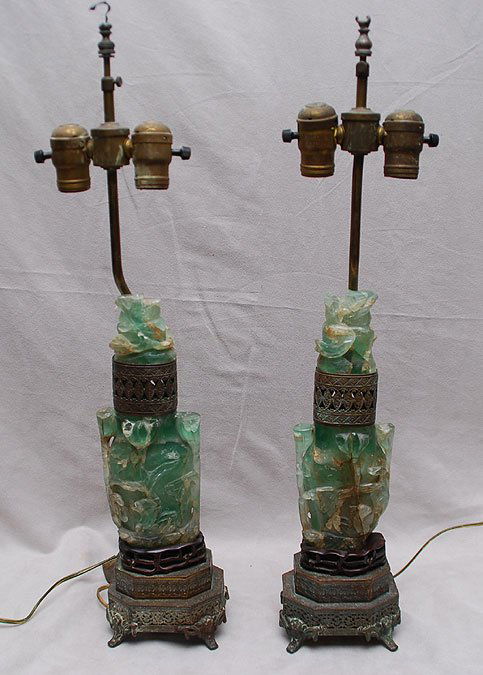 Pair of Jadite quartz lamps on pierced footed bras: Pair of Jadite quartz lamps on pierced footed brass bases, lamps alone are 16"h (one of inserts broken)