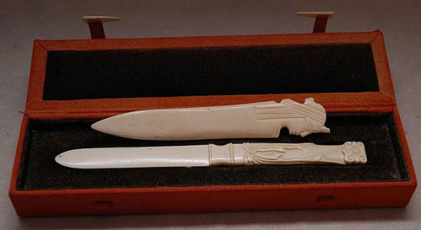 2 ivory letter openers in box, figural is 5 5/8"l,: 2 ivory letter openers in box, figural is 5 5/8"l, non figural is 7 3/8"