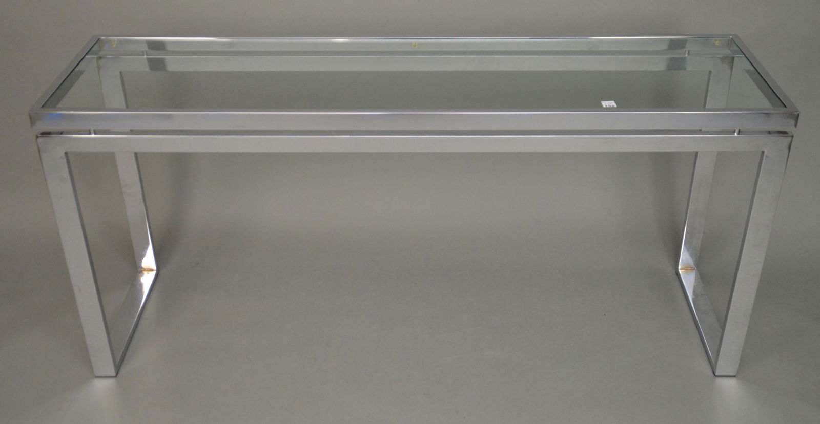 MILO BAUMAN STYLE CHROME & GLASS CONSOLE TABLE. (1 of 3)