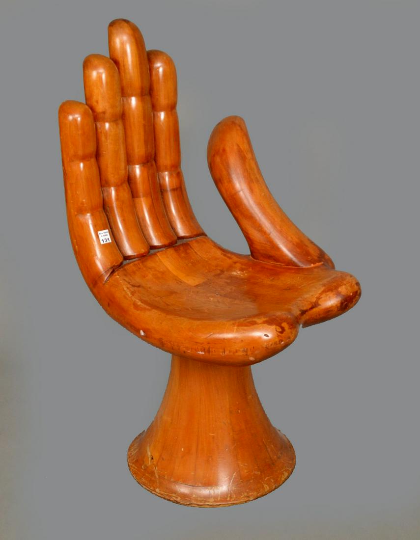 Possibly by Pedro Friedeberg (Mexican/Italian, 20th: Possibly by Pedro Friedeberg (Mexican/Italian, 20th Century b. 1936) Hand Chair, Carved Wooden chair in the form of a hand. H. 36” x W. 19” Condition: Used. Provenance: Capital Bank
