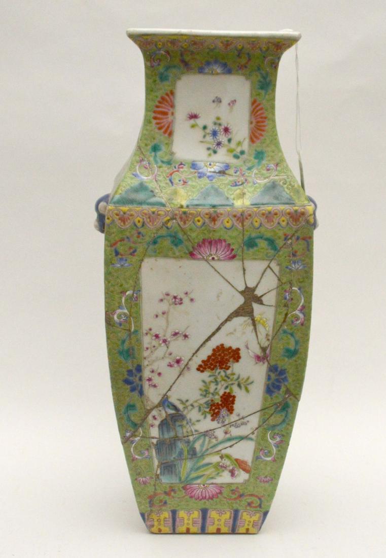 CHINESE FAMILLE ROSE PORCELAIN VASE with Qianlong mark: CHINESE FAMILLE ROSE PORCELAIN VASE with Qianlong mark on the bottom. Condition: this piece has been damaged and mended back together. Height 16 7/8"