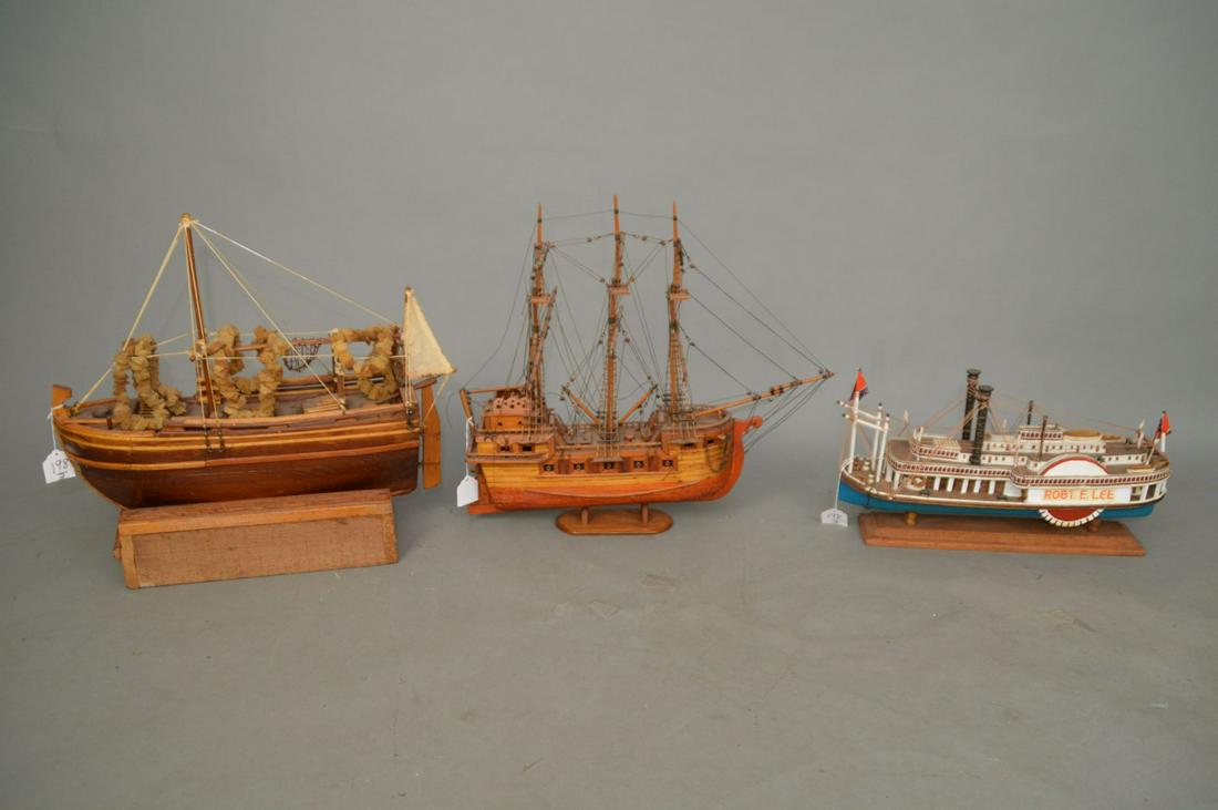 THREE WOODEN MODEL SHIPS - A handmade wooden ship with (1 of 8)