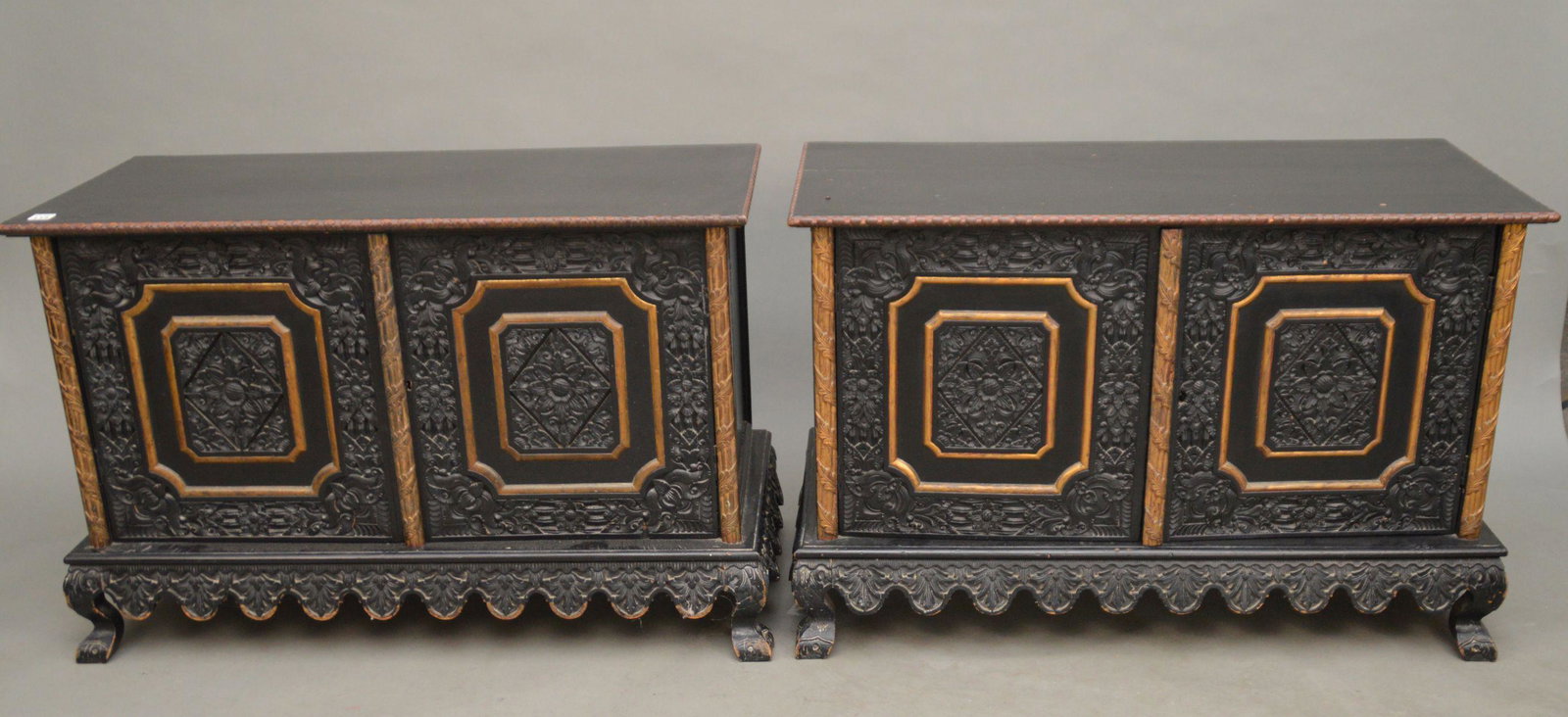 Pair of Black with Gold Accent Cabinets with 2 carved: Pair of Black with Gold Accent Cabinets with 2 carved paneled doors on each, single shelf interior, 23 1/2"h x 36"w x 17"d