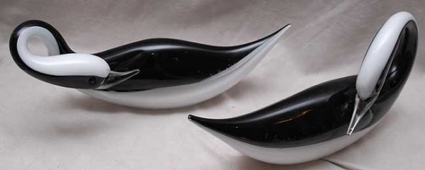 Pair black and white Murano swans, signed by artis