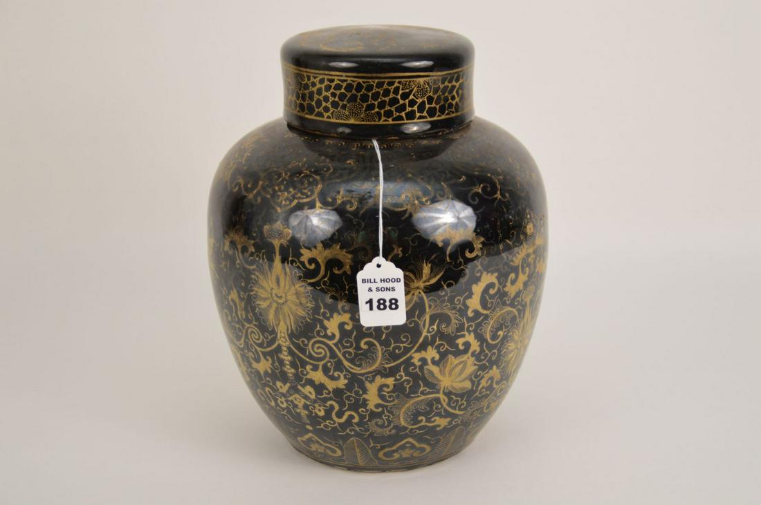 ANTIQUE CHINESE GILT & BLACK GLAZE PORCELAIN GINGER: ANTIQUE CHINESE GILT & BLACK GLAZE PORCELAIN GINGER JAR- Intricate gilt decoration over a mirrored black glaze ground. “Made in China” stamp on bottom in red. Dimensions: 10” H without lid, 11 3
