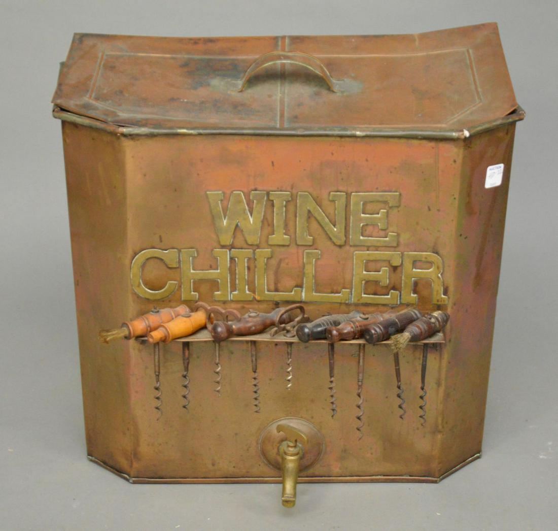 ANTIQUE COPPER WINE CHILLER WITH NINE CORKSCREWS -: ANTIQUE COPPER WINE CHILLER WITH NINE CORKSCREWS - Large copper hanging wine box with spikes. Nine corkscrews with wood and metal handles. Dimensions: Wine Chiller - 18” H x 20” W x 9” D. Condit