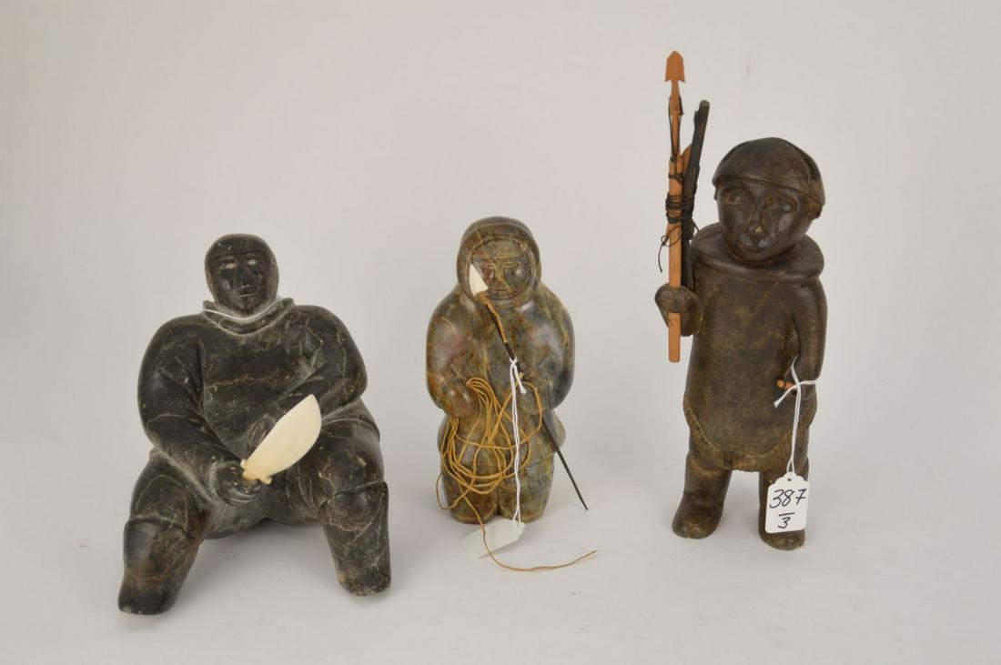 THREE VINTAGE INUIT CARVED SOAPSTONE FIGURES - Grouping (1 of 11)