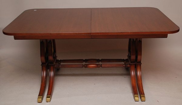 Mahogany dining table with double lyre form trestle: Mahogany dining table with double lyre form trestle style supports