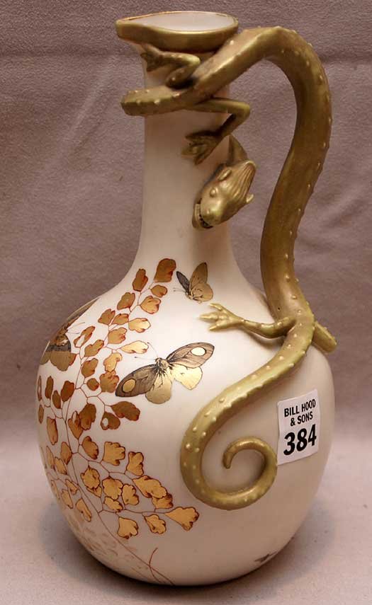 Royal Worcester ewer with applied dragon, handle : Royal Worcester ewer with applied dragon, handle is gold leaf butterfly design, drilled at bottom, 9"h