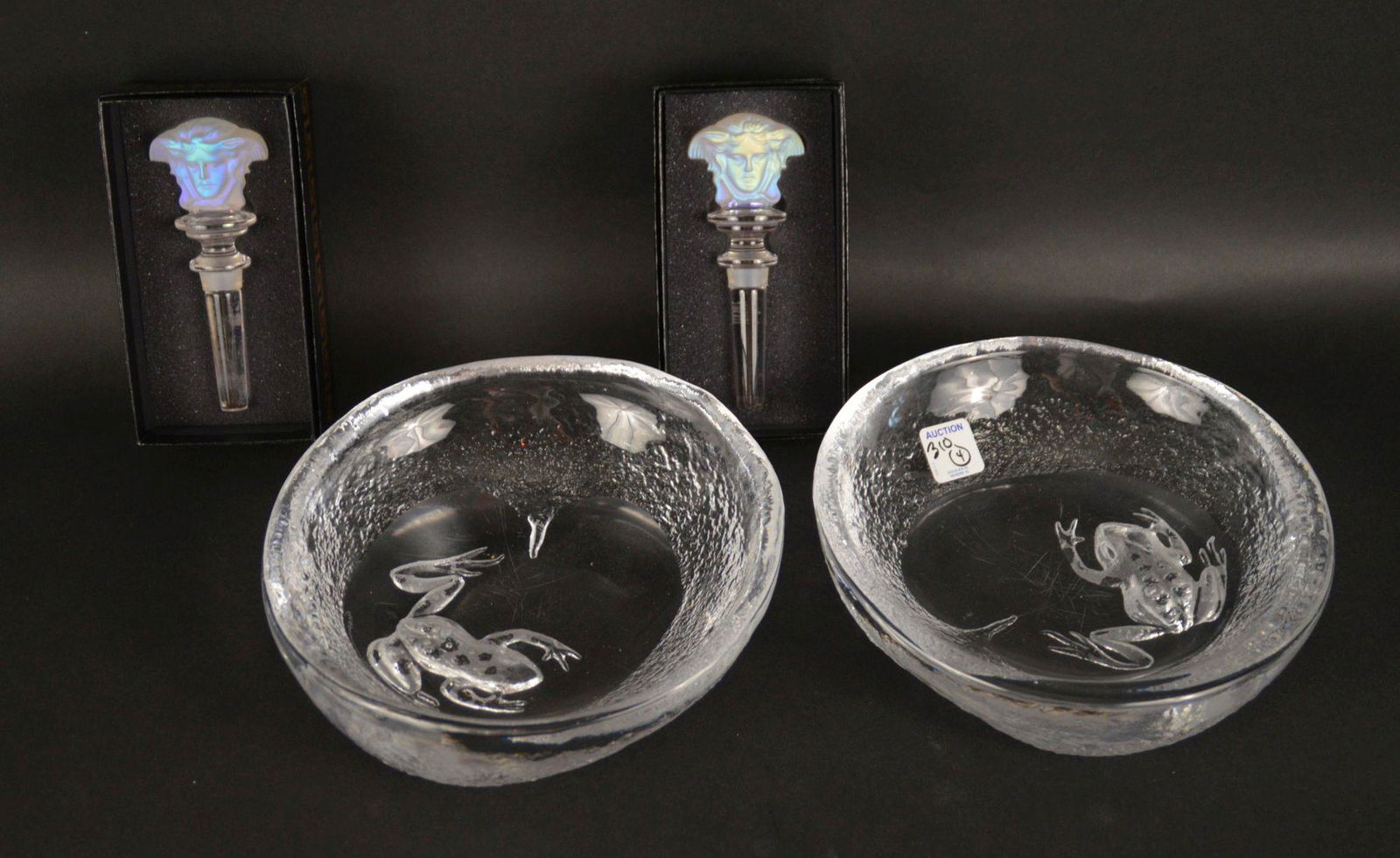 PAIR CRYSTAL BOWLS, PAIR OF VERSACE STOPPERS: PAIR CRYSTAL BOWLS with Frogs, signed illegible, 3"h x 8 1/2"dia, (scratches on bottom) AND PAIR OF VERSACE for Rosenthal Opalescent Wine Stoppers (in original boxes)