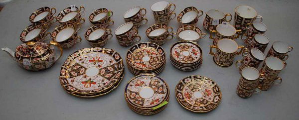 63pcs Royal Crown Derby "Traditional Imari pattern": 63pcs Royal Crown Derby "Traditional Imari pattern" incl; 9 coffee cups, 14 tea cups, 13 saucers, 12 demitasse cups, 7 saucers, 2 double handled cans, 1 large coffee mug, 3 cake plates, 1 creamer, tea