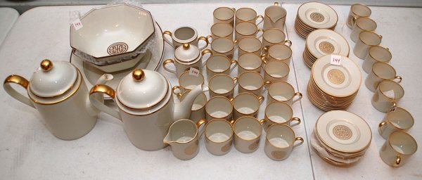 Approximately 75 pcs Fitz & Floyd "Gold Mandarin C: Approximately 75 pcs Fitz & Floyd "Gold Mandarin Crest FF8" incl; 30 demi-tasse cups, 36 demi-tasse saucers, 2 coffee pots, 2 creamers, 2 sugars (1 lid missing) 2 octagonal bowls, 1 oval serving platt