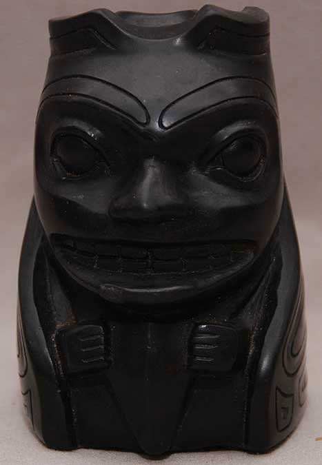 NORTHWEST COAST 1800-1900 Argillite Haida or Tingli: NORTHWEST COAST 1800-1900 Argillite Haida or Tinglit carved Totem with incised date. Fined-grained carbonacious black shall representing a powerful Bear Spirit. From a Palm Beach collection. Size: 3 1