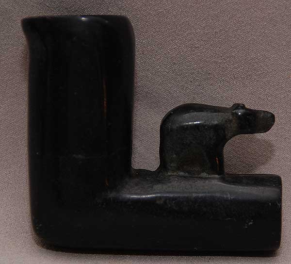 BEAR PIPE. 1800-1925. Very rare hand carved pipe wi: BEAR PIPE. 1800-1925. Very rare hand carved pipe with bear from Serpentine Stone. Intricate fabulous details . Similar exemples could be seen at the British Columbia Museum. Measuring 3 1/2 "diagonal 