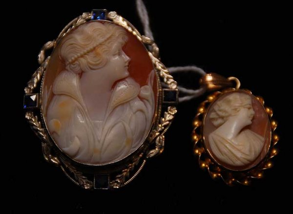 Cameos, 1 shell cameo set in 14kt white gold fram: 2 Cameo's, larger one is an unusual carved Gibson girl in 14kt white gold bezel, smaller one marked 10kt on bail but bezel possibly is 14kt