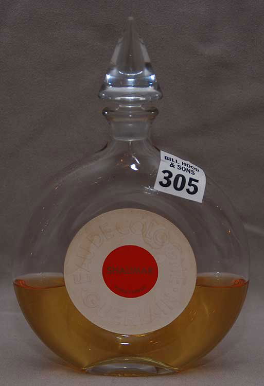 Shalimar perfume bottle, 1/2 full, guerlain, 7": Shalimar perfume bottle, 1/2 full, guerlain, 7"