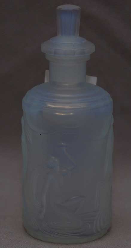 Etched on bottom Sabino Paris perfume bottle with : Etched on bottom Sabino Paris perfume bottle with nude bathers & swans, 4"h