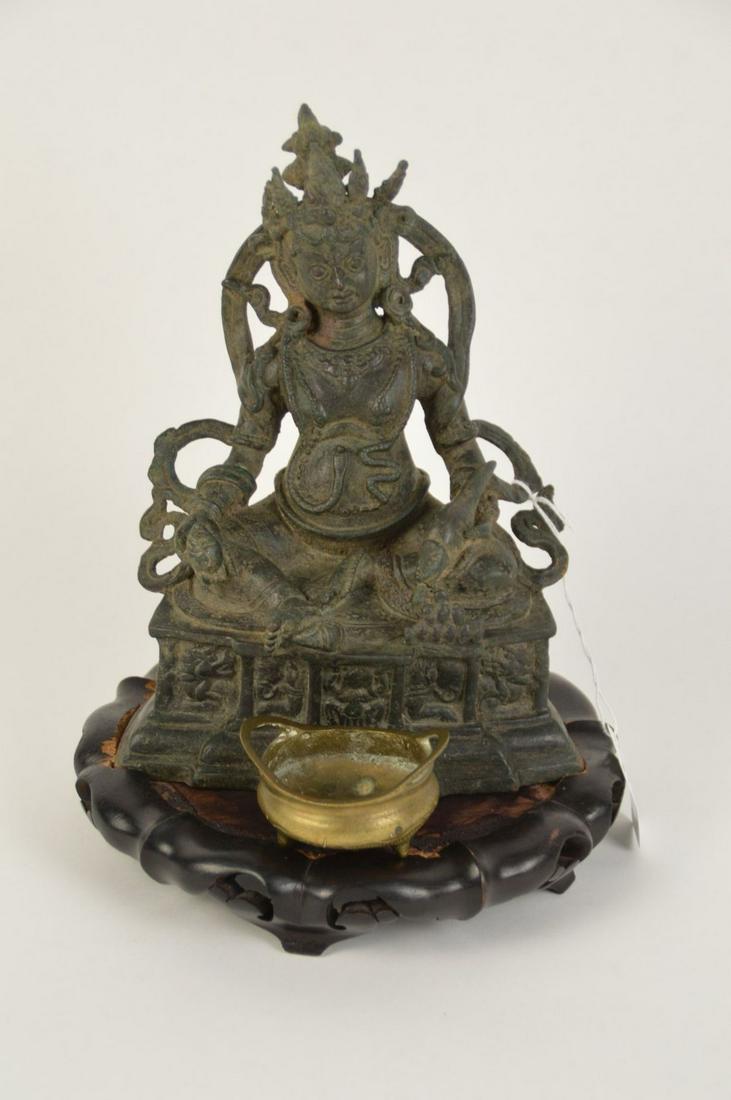 Patinated Bronze Buddhist Deity Statue together with (1 of 7)
