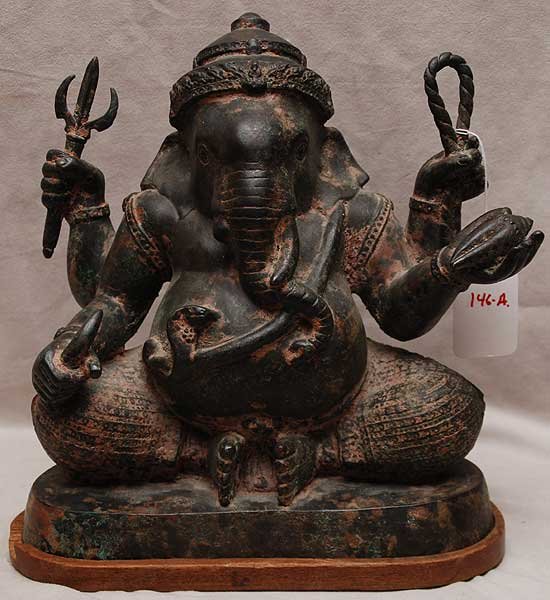 Bronze mythological animal holding weapon in each: Bronze mythological animal holding weapon in each hand, 11"h x 12"L x 6"w