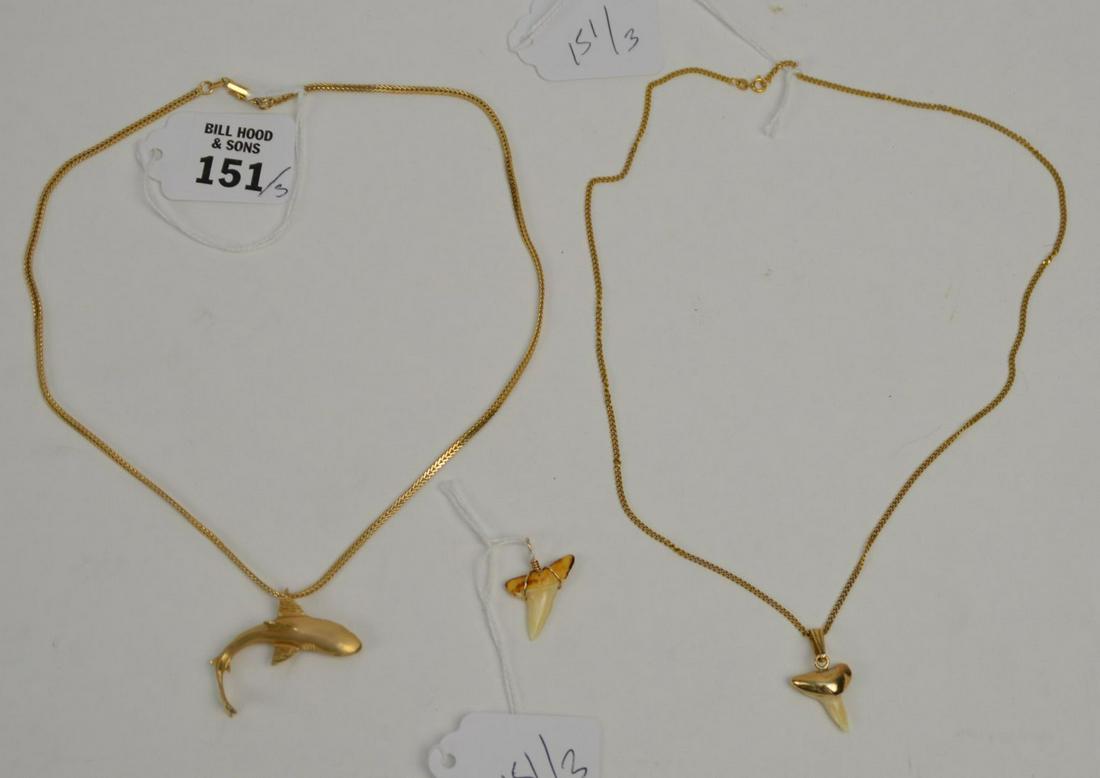2 - 14 K Yellow Gold Chain with Shark & Tooth Pendant.: 2 - 14 K Yellow Gold Chain with Shark & Tooth Pendant. Weight 22.2 grams. 1 chain 18" with shark pendant 1.75" , 1 Chain 19" with shark tooth 1.25" plus an extra tooth with gold wire. All in good cond