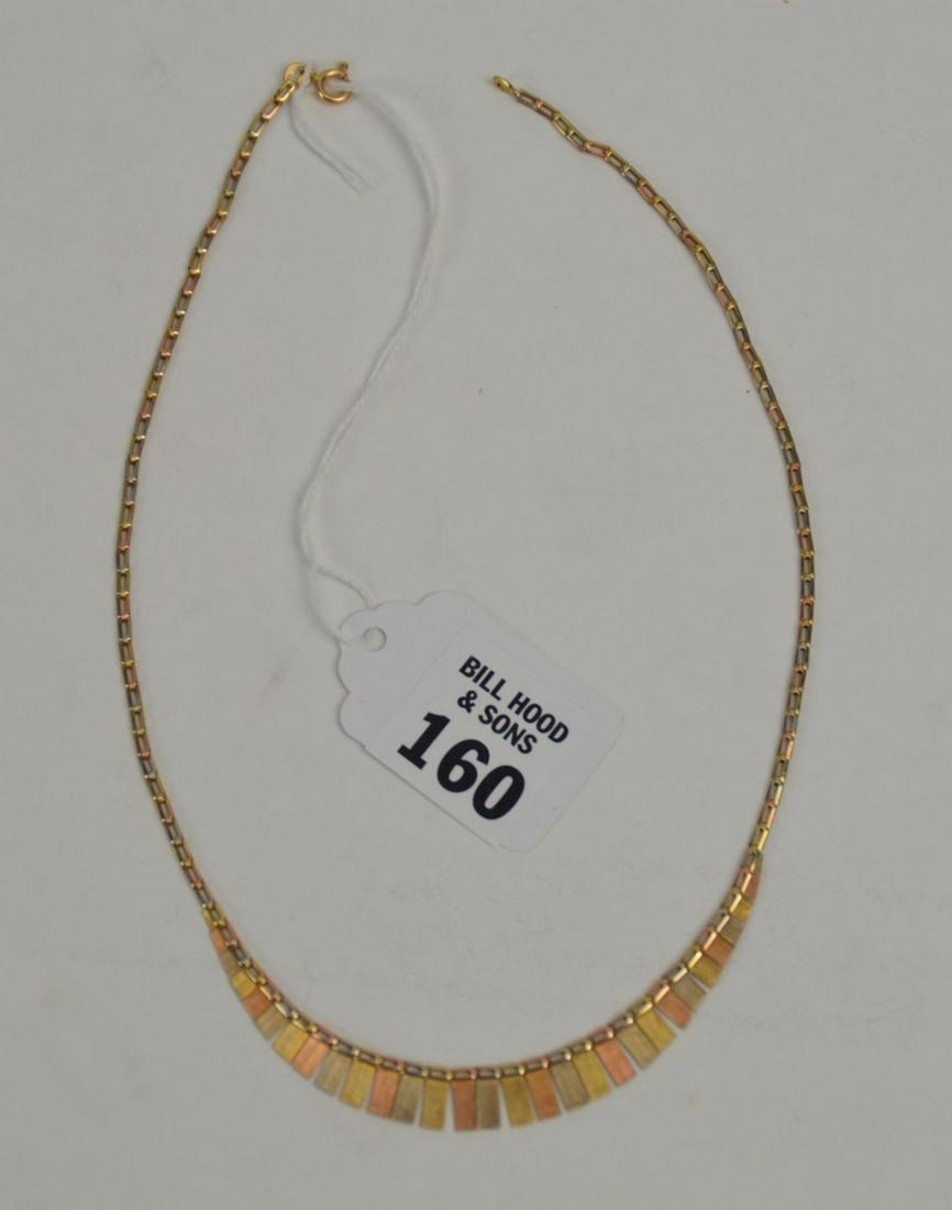 14K Tri-Color Gold Necklace 16" . Weight 5.7 grams in: 14K Tri-Color Gold Necklace 16" . Weight 5.7 grams in good condition
