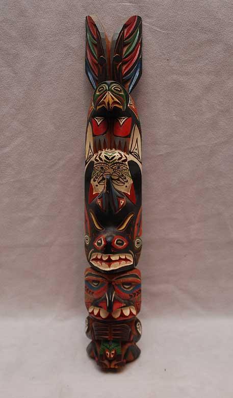 Totem pole stamped, Real Indian Made, the Curiosity: Totem pole stamped, Real Indian Made, the Curiosity Shop, Seattle Washington since 1899, 17 5/8"h