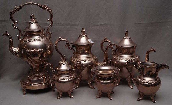 Large 6pc. Silver plate tea service, incl; hot wat: Large 6pc. Silver plate tea service, incl; hot water kettle on stand, teapot, coffeepot, covered sugar, creamer and waste bowl