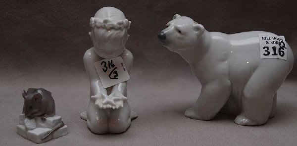 4 porcelain pcs; Royal Copenhagen rodent ( 1 1/2"h: 4 porcelain pcs; Royal Copenhagen rodent ( 1 1/2"h), Lladro bear (5"h x 4"L) and B & G cupid #2265 (4 1/2"h) and Finland Polar Bear