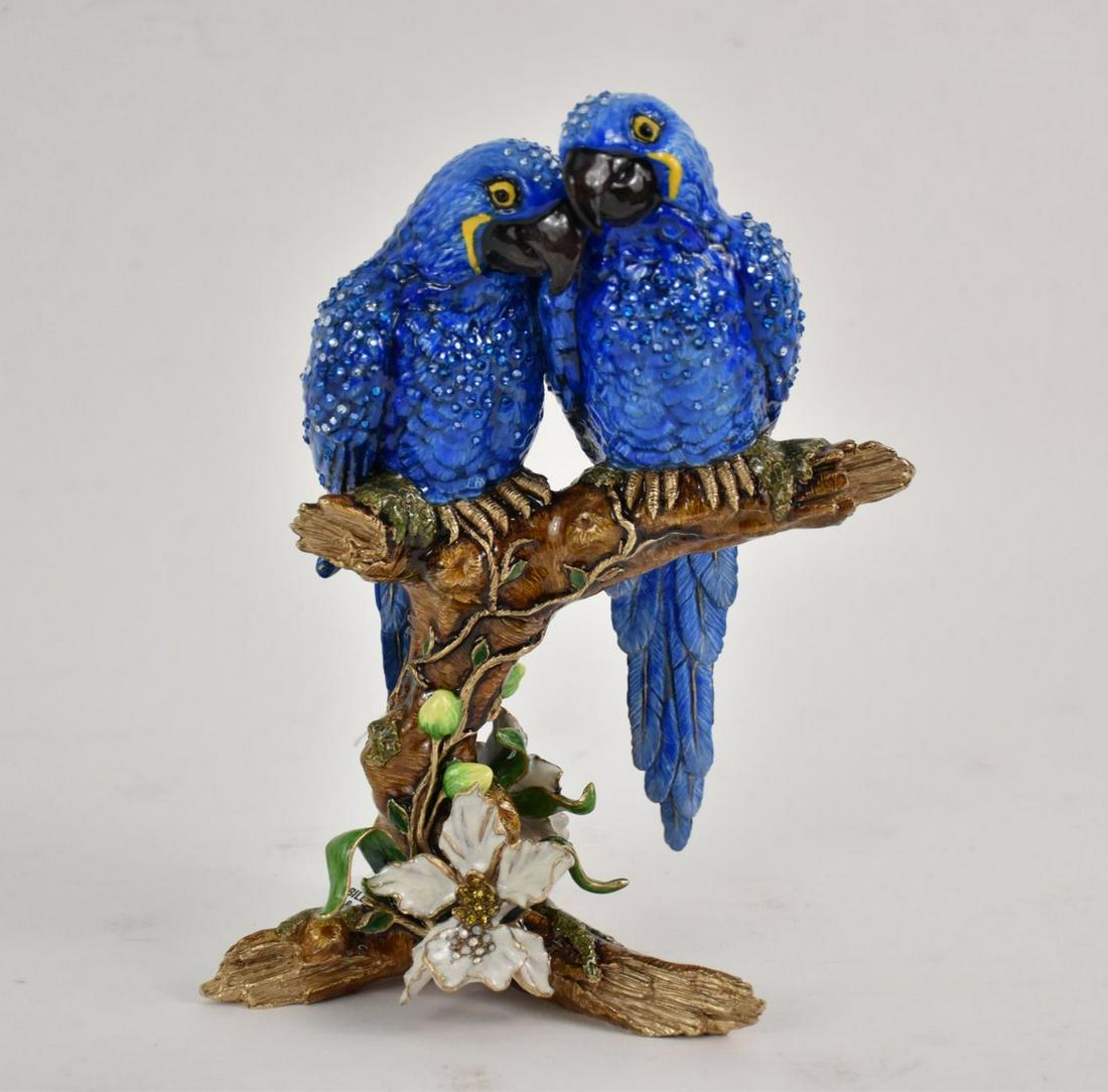 Jay Strongwater Macaws On Branch Figurine 10” x 6” With: Jay Strongwater Macaws On Branch Figurine 10” x 6” With original box. We can not locate the Strongwater label on this piece. The piece is in it's original box and also viewed in the Strongwater ca