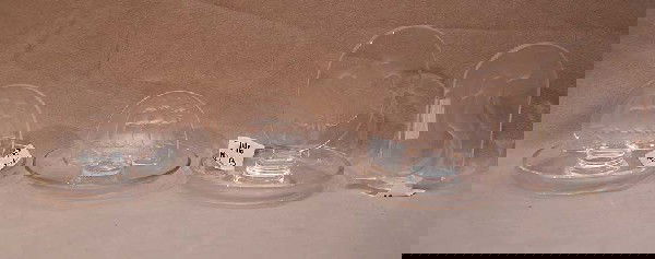 Pair of Lalique clipper ship ring holders, 1 eagl: Pair of Lalique clipper ship ring holders, 1 eagle ring holder and 1 nude panel