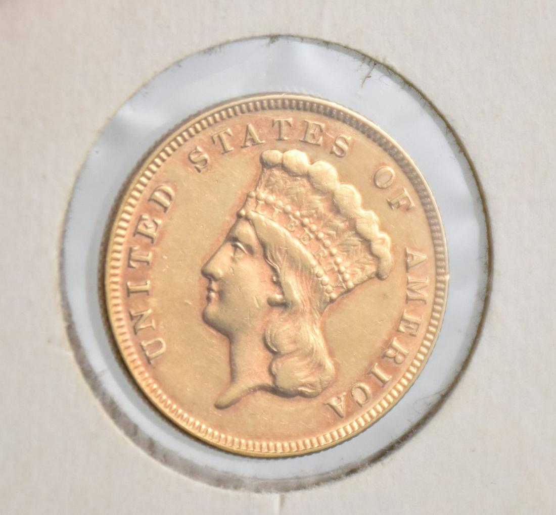 1874 III Dollar Gold Coin. (1 of 4)