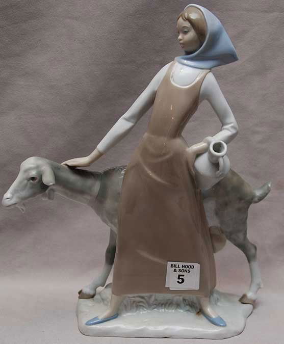 Porcelain figurine "Made In Spain" maiden with goat,: Porcelain figurine "Made In Spain" maiden with goat, 11"h