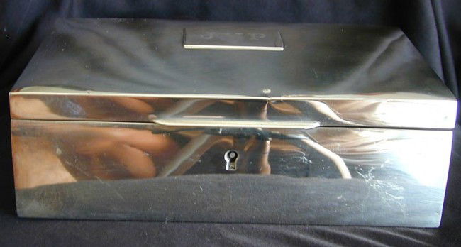 TIFFANY STERLING SILVER JEWELRY BOX, 30 TROY OZ Bl: TIFFANY STERLING SILVER JEWELRY BOX, 30 TROY OZ Blue velvet inserts and ring tray, 8.25"L x 5.25"D x 3"H, hinged with applied monogrammed plaque JVP, w/ lock front (missing key), 2 small dents to top