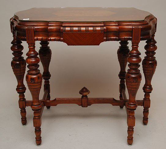 Mahogany and walnut turtle top table design on top: Mahogany and walnut turtle top table design on top, turned bulbous legs on stretcher base, glass top