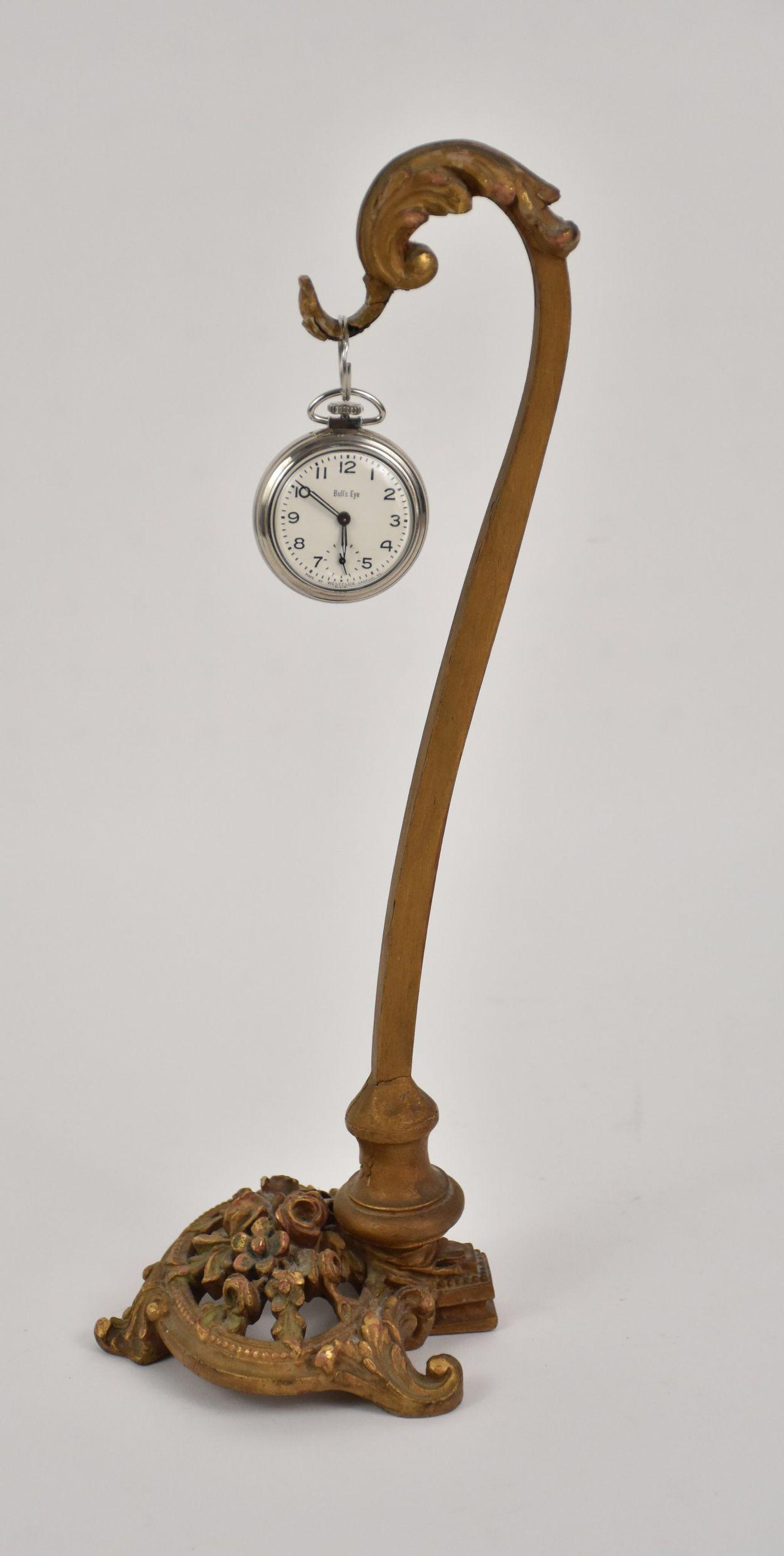 Pair of Vintage Pocket Watches and Stand. A Bull’s eye: Pair of Vintage Pocket Watches and Stand. A Bull’s eye Westclox, Lasalle, Illinois (USA). The other, a Westclox Scotty shock resistant. Both mechanical & both in good working condition. Together wit