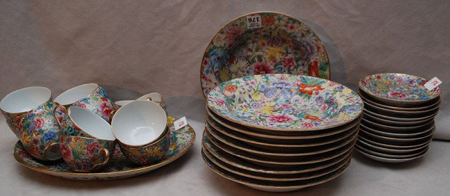 Set incl; Chinese china ware all over multi color : Set incl; Chinese china ware all over multi color floral design 9 soup bowls, oval platter, 2 saucers, 14 cups