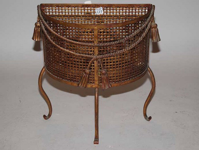 Metal half moon waste basket / magazine rack with : Metal half moon waste basket / magazine rack with tassels at front, 20"h x 20"w