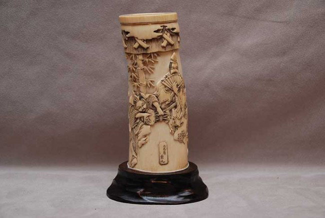 Antique Japanese ivory Tusk, high relief carving of: Antique Japanese ivory Tusk, high relief carving of entertainers in a bamboo grove, 7-1/4"h, signed