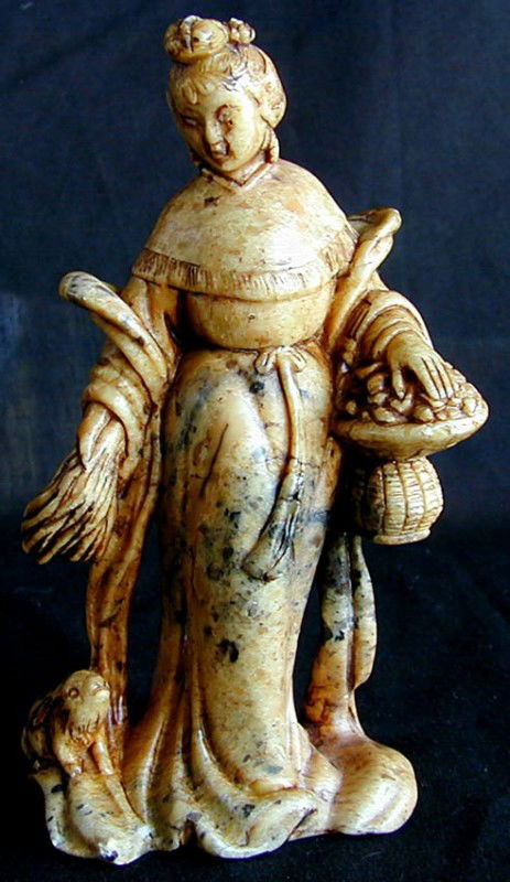 ANTIQUE CHINESE CARVING OF RABBIT & ROYAL WOMANAn: ANTIQUE CHINESE CARVING OF RABBIT & ROYAL WOMANAn antique Chinese soapstone carving of a royal woman carrying a basket of fruit looking down towards the rabbit by her foot, 6.5"H, etched CHINA on bott
