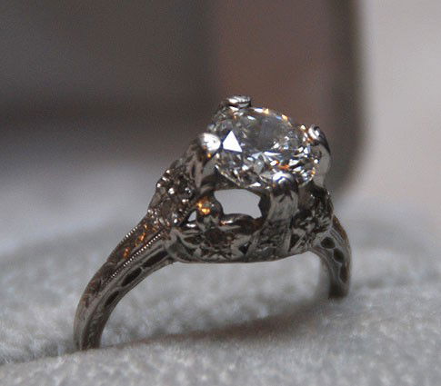 Ladies platinum engagement ring, approx 1.5 ct dia: Ladies platinum engagement ring, approx 1.5 ct diamond in center (VS2, color F), 10.05 pt. and 21.06 around base of the head, antique style setting