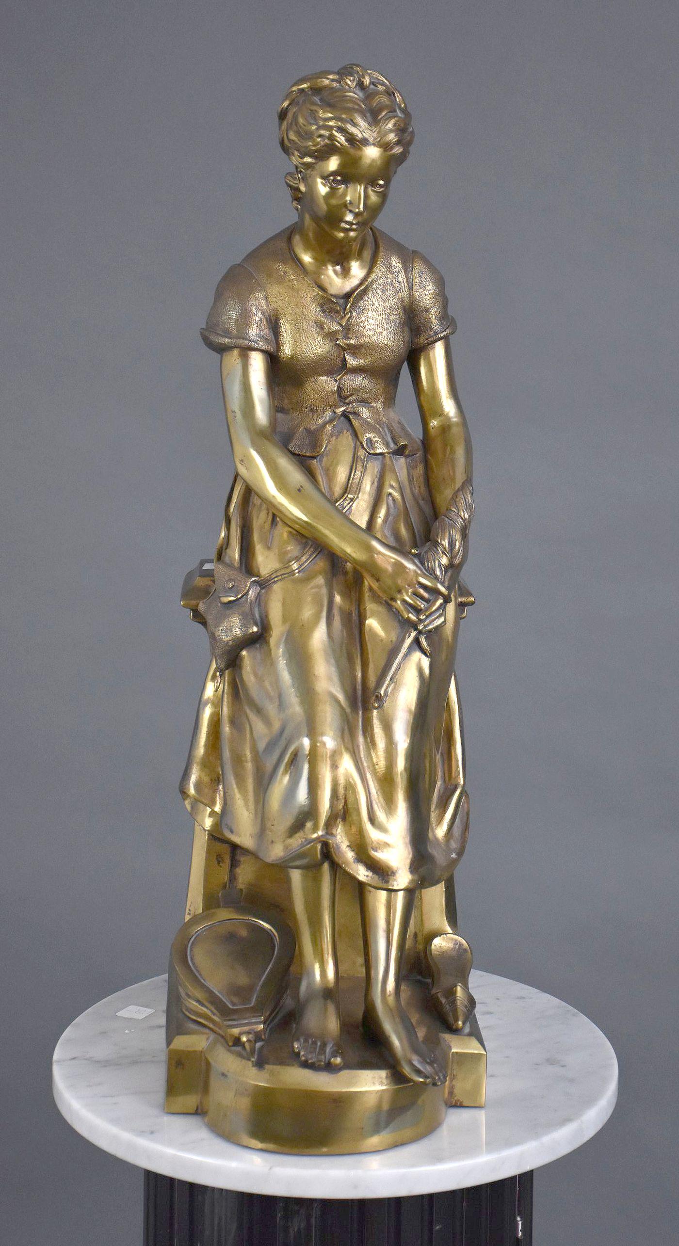 Bronze Sculpture of a Colonial Female - an antique gold patinated bronze figure of a woman in (1 of 8)