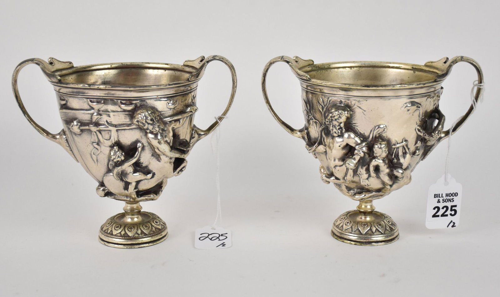 Pair Of Silveroid Cast Metal Footed Classical Cups - Late 19th Century. Each with strap handles. The (1 of 10)